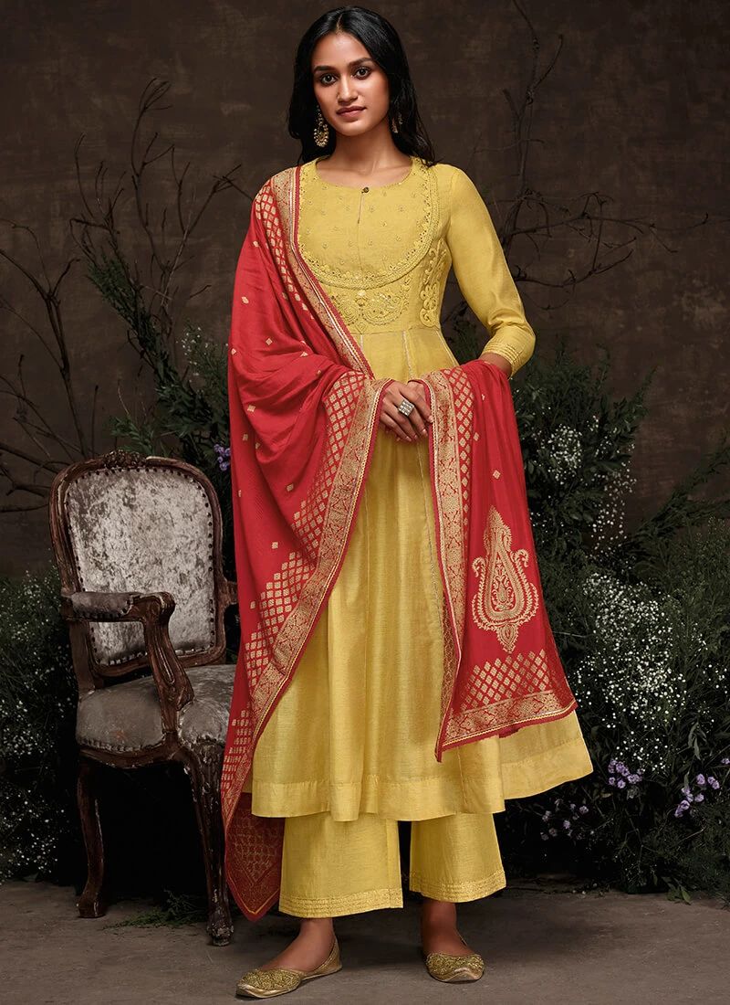 Slim lady wearing a Yellow & Red Anarkali Suit